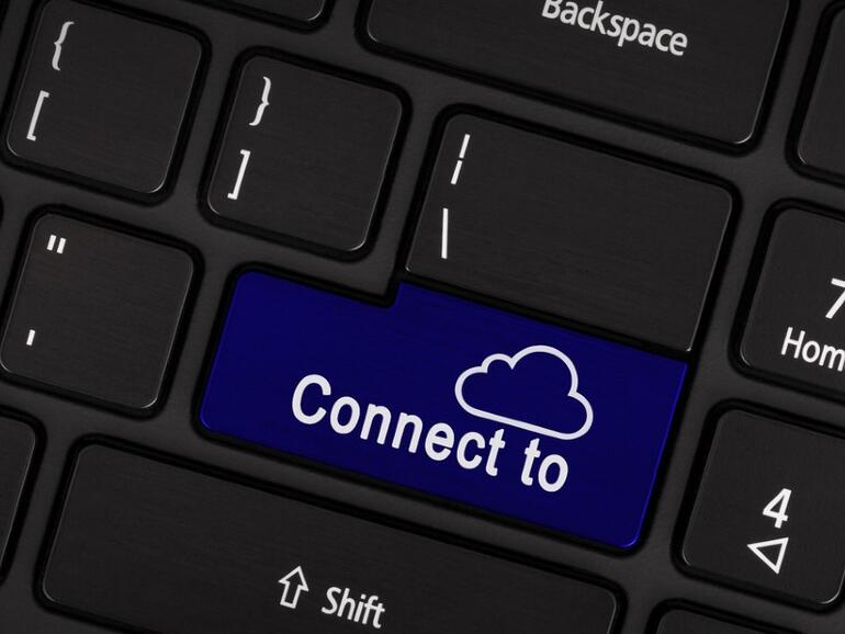 Tecla de computadora azul: conéctese a la nube