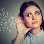 Conceptual images of a woman listening to a stream of abstract letters.