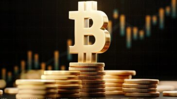 Bitcoin symbol atop stacked bitcoins with abstract financial chart data