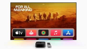 Apple TV 4K 2022 in front of TV showing Apple TV inteface