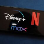 Disney Plus, Netflix and HBO Max logos on an iPhone screen