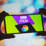 HBO Max and Discovery Plus logos on smartphone screen