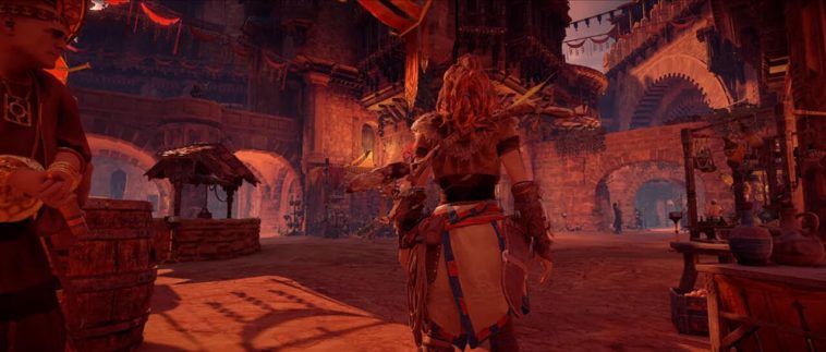 Aloy llega a un pueblo de la versión original de Horizon Zero Dawn.