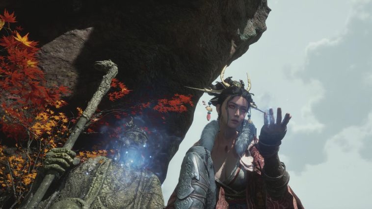 Wuchang se arrodilla como pulsos mágicos en su mano.